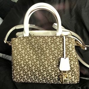DKNY medium satchel White with DKNY logo in brown and has gold accents